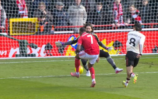 Liverpool goalkeeper Alisson Becker diving to make a save against Nottingham Forest