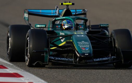 Fernando Alonso talking to Adrian Newey in the Aston Martin garage during F1 pre-season testing