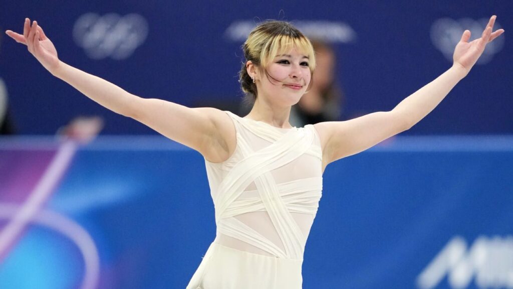 Alysa Liu smiling with multicoloured hair at the US Figure Skating Championships