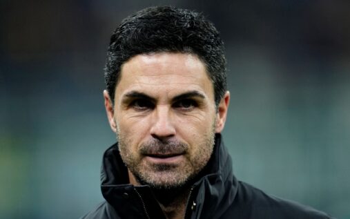 Raphinha celebrating a goal for Barcelona while looking towards the crowd