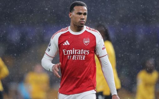 Arsenal defender Gabriel Magalhães gesturing on the pitch during a Premier League match