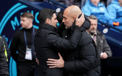 Mikel Arteta issuing instructions to Arsenal players on the touchline during a Premier League match.