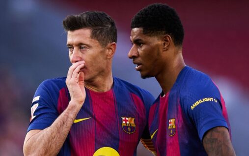 Barcelona manager Hansi Flick looking pensive on the touchline during a La Liga match