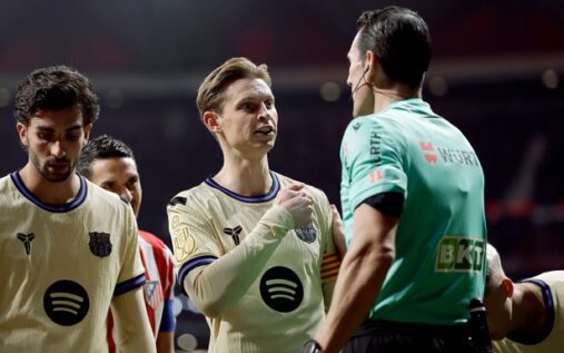 Barcelona manager Hansi Flick looking frustrated on the touchline during the match against Atletico Madrid