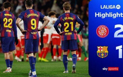 Barcelona players look dejected on the pitch after conceding a goal against Girona in La Liga