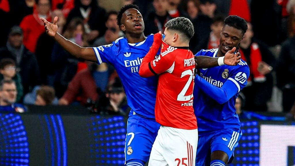 Gianluca Prestianni and Vinicius Junior on the pitch during the Champions League match