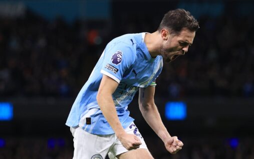 Bernardo Silva of Manchester City contesting a ball with Newcastle United defender Dan Burn