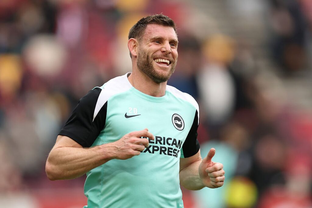James Milner applauding fans while playing for Brighton & Hove Albion