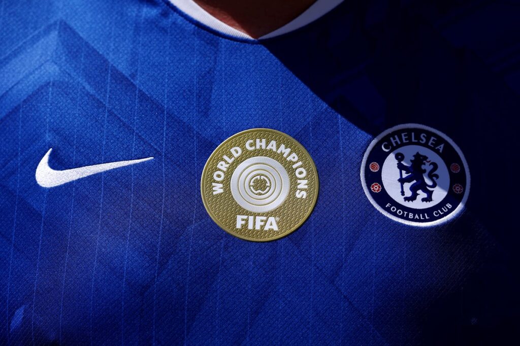 Close up of the Chelsea club crest on a blue home shirt
