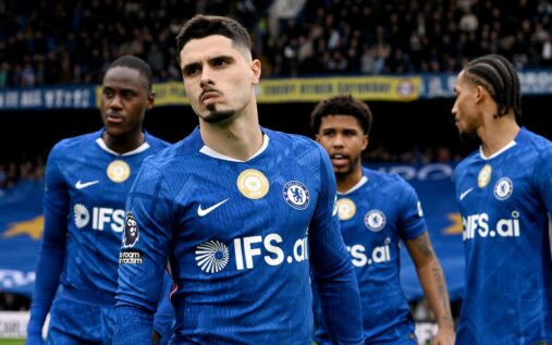 Chelsea manager Liam Rosenior looking concerned on the touchline during a Premier League match