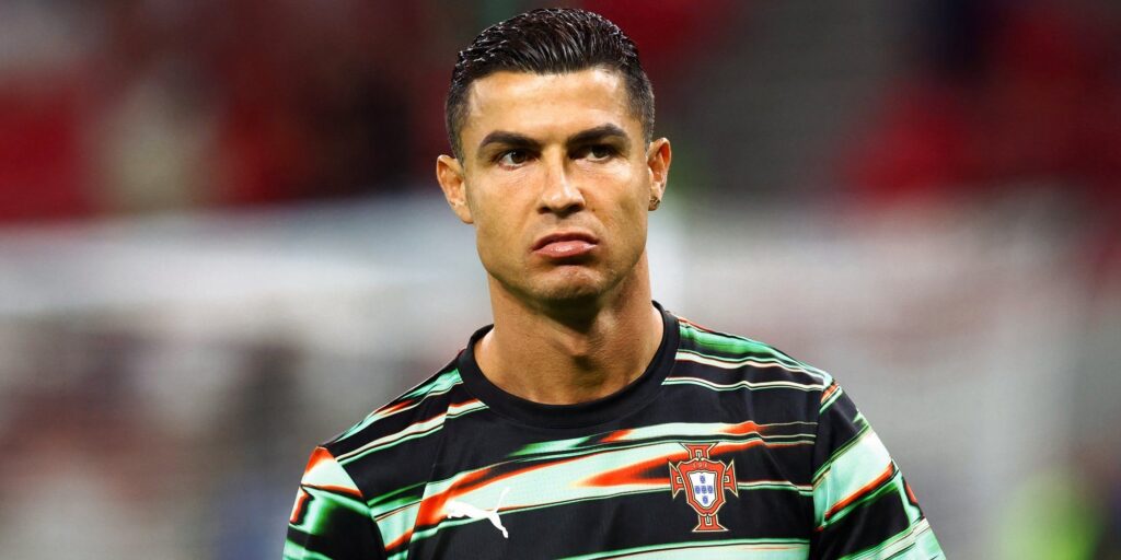 Cristiano Ronaldo applauding fans while playing for Al-Nassr