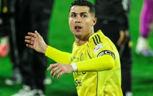 Cristiano Ronaldo gesturing on the pitch during an Al-Nassr match in the Saudi Pro League