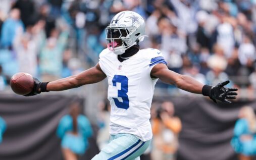 George Pickens running with the ball in a Dallas Cowboys uniform