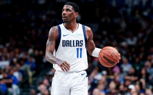 Dallas Mavericks guard Kyrie Irving looking focused on the court during an NBA game