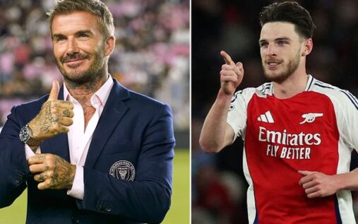 Declan Rice celebrating a goal for Arsenal with his arms raised