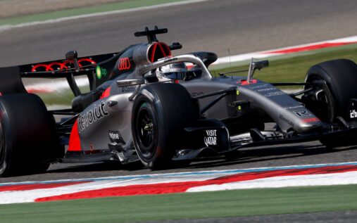 Lando Norris driving the McLaren Formula 1 car on a race track