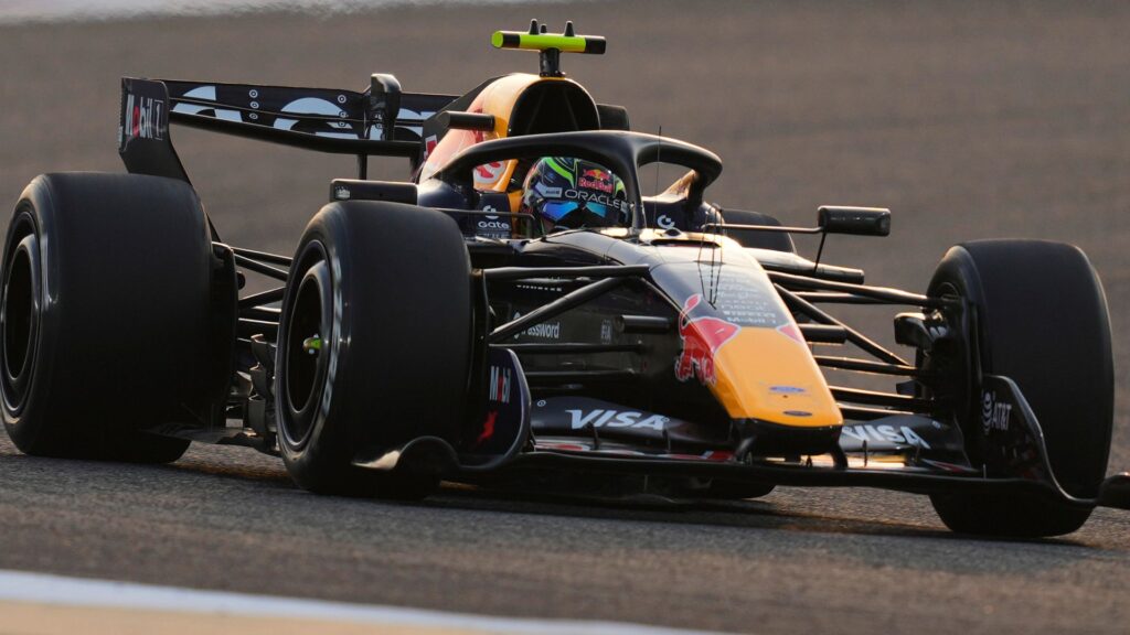 A Formula 1 car driving on the track during pre-season testing in Bahrain