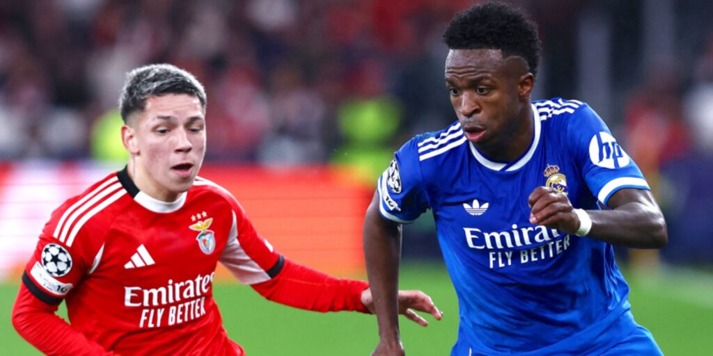 Real Madrid forward Vinicius Jr confronting an opponent during a Champions League match