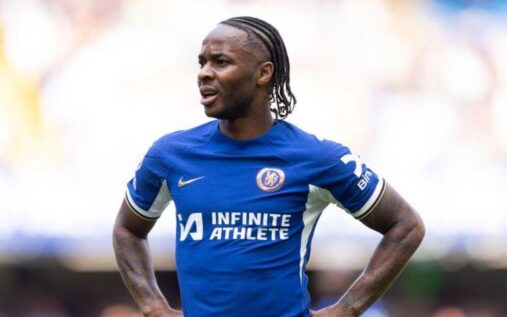 Raheem Sterling in discussion with Feyenoord manager Robin van Persie during a training session