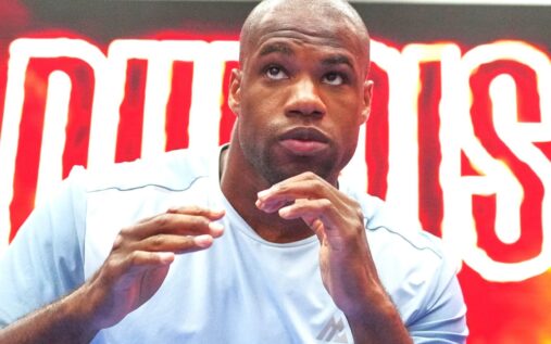 Promoter Frank Warren standing alongside heavyweight boxer Daniel Dubois at a press conference