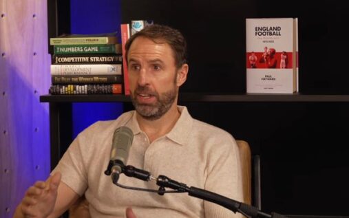 Gareth Southgate looking pensive in a suit during his tenure as England manager