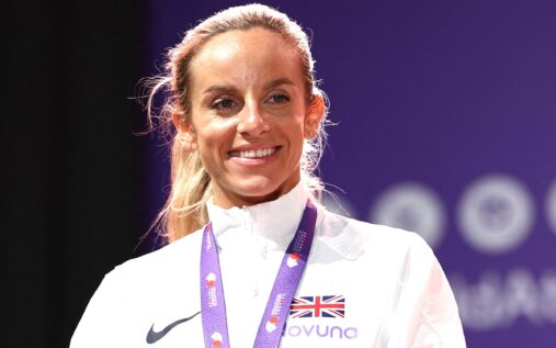 Georgia Bell competing on the track in a Team GB vest during a 1500m race