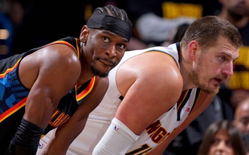 Shai Gilgeous-Alexander dribbling the ball for the Oklahoma City Thunder during an NBA game