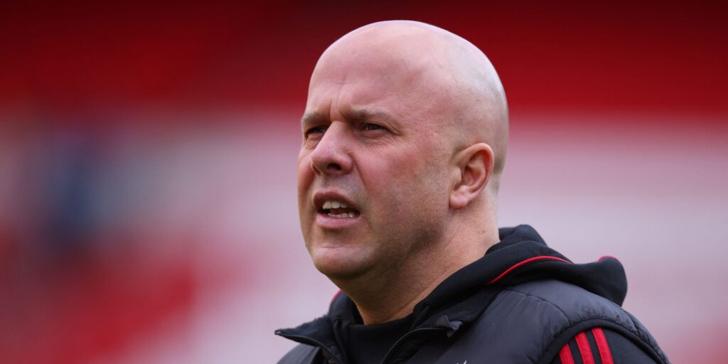 Liverpool goalkeeper Giorgi Mamardashvili warming up in his kit before a match