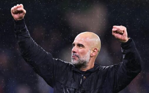 Pep Guardiola celebrating passionately on the touchline during Manchester City's match against Newcastle United