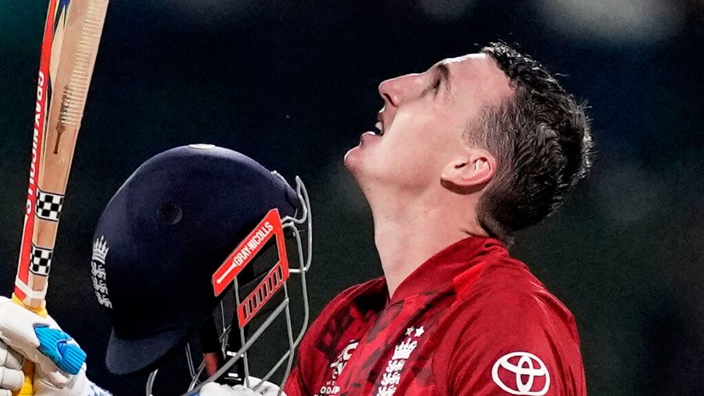 England captain Harry Brook celebrating his century with bat raised and helmet off during the T20 World Cup match against Pakistan