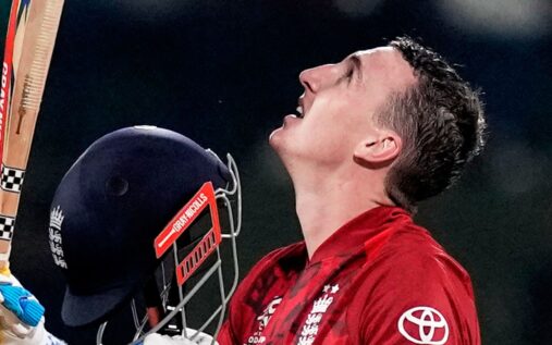 England captain Harry Brook celebrating his century with bat raised and helmet off during the T20 World Cup match against Pakistan