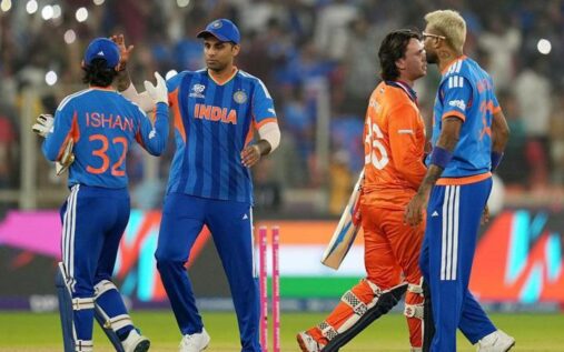 Shivam Dube raising his bat to the crowd after scoring a half-century for India against the Netherlands