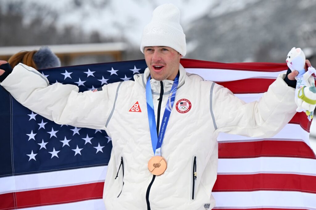 US snowboarder Jake Canter celebrating his bronze medal win at the Winter Olympics slopestyle event