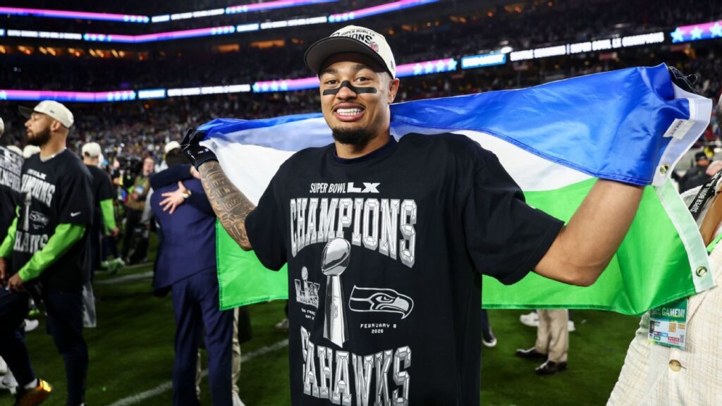 Seattle Seahawks wide receiver Jaxon Smith-Njigba looking towards the field during an NFL game