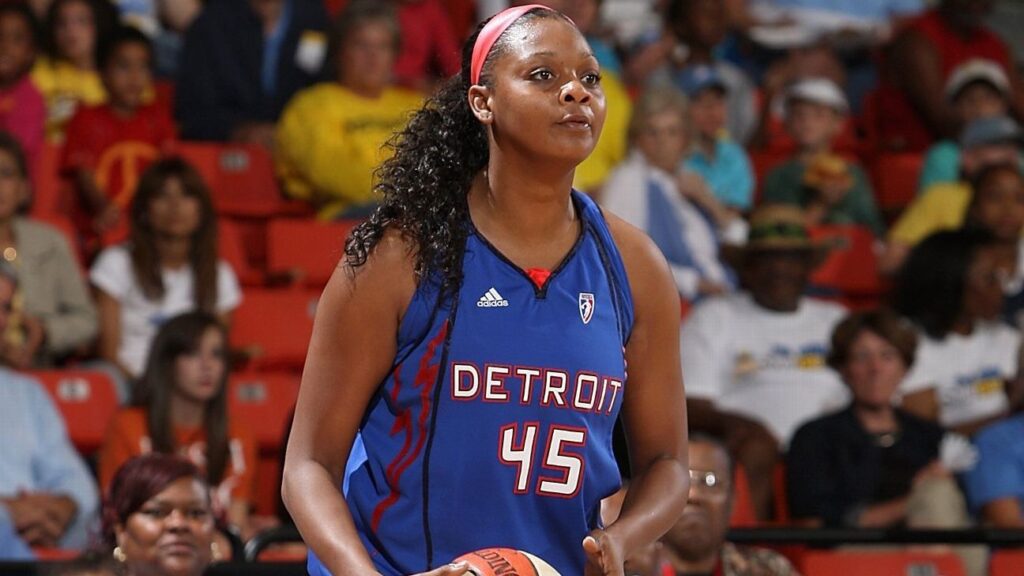 Kara Braxton playing basketball for the Detroit Shock during a WNBA game