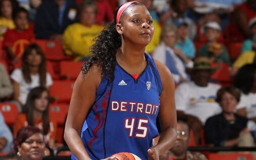Kara Braxton playing basketball for the Detroit Shock during a WNBA game