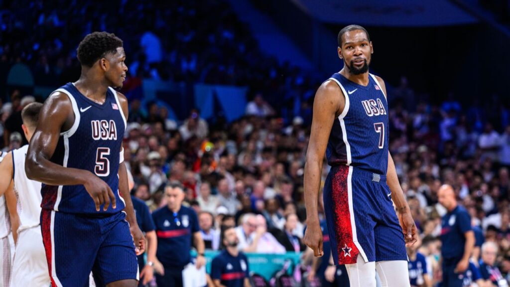 Kevin Durant celebrating with his fourth Olympic gold medal while playing for Team USA basketball