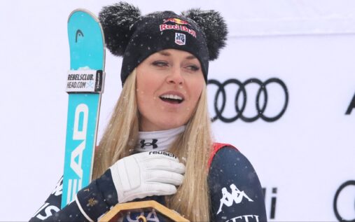 Lindsey Vonn wearing a Team USA ski suit and helmet looking focused on the slopes before the 2026 Winter Olympics crash