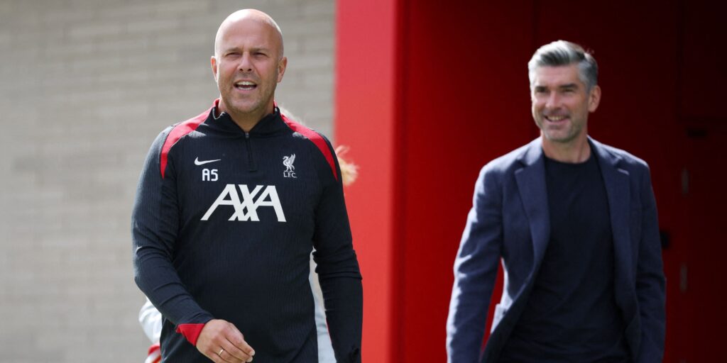 Liverpool FC crest displayed on the exterior of the AXA Training Centre in Kirkby