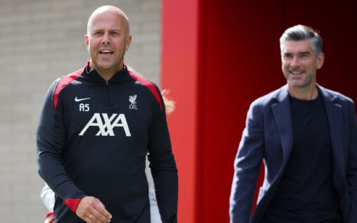 Liverpool FC crest displayed on the exterior of the AXA Training Centre in Kirkby