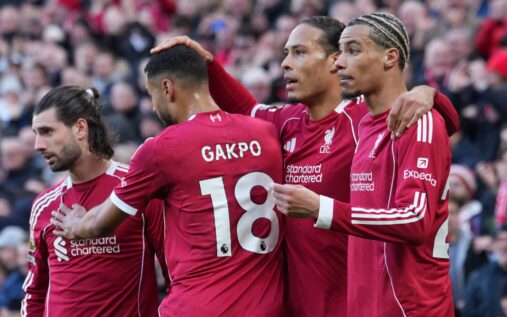 Liverpool players celebrating a goal against West Ham at Anfield during a Premier League match