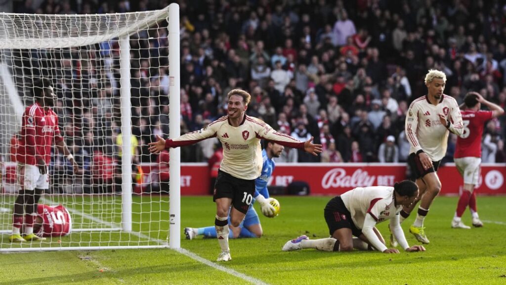 Alexis Mac Allister celebrates with teammates after scoring a late winner for Liverpool against Nottingham Forest