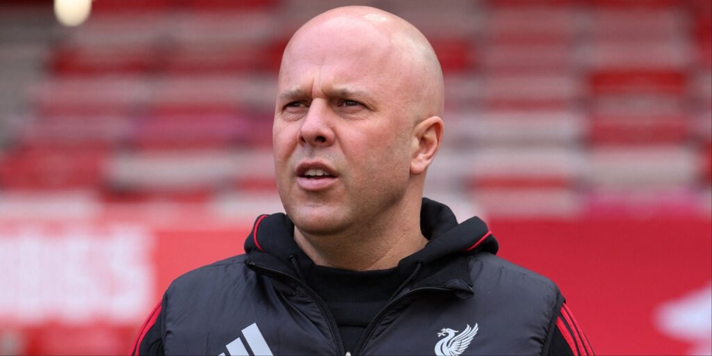 Joao Neves in action for Paris St-Germain during a Ligue 1 match, controlling the ball in midfield