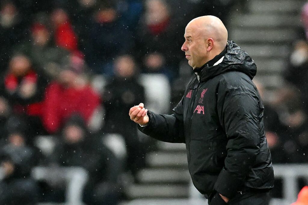 Liverpool manager Arne Slot looking concerned on the touchline during a Premier League match