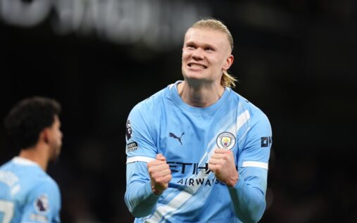 Manchester City players celebrating a goal at the Etihad Stadium