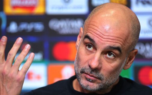 Manchester City manager Pep Guardiola looking pensive on the touchline during a Premier League match