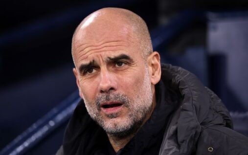 The Manchester City crest on the exterior of the Etihad Stadium