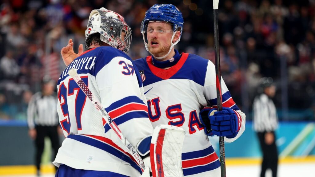 Auston Matthews skating with the puck for Team USA during the Olympic ice hockey match against Germany