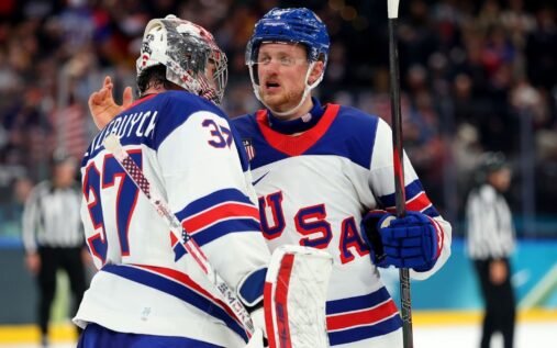 Auston Matthews skating with the puck for Team USA during the Olympic ice hockey match against Germany