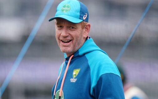 Australia head coach Andrew McDonald watching players train in the nets during a practice session